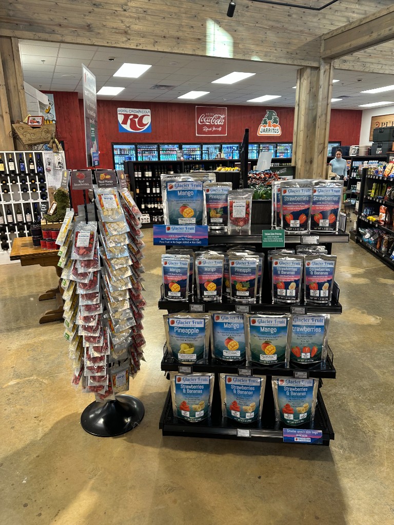 Glacier Fruit spinner rack and full-line shelf display at Redstone Market & Butcher, Athens GA